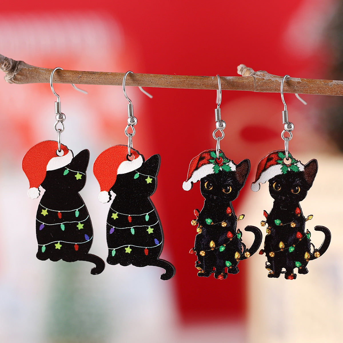 Christmas hat and colorful lights black cat pendant earrings
