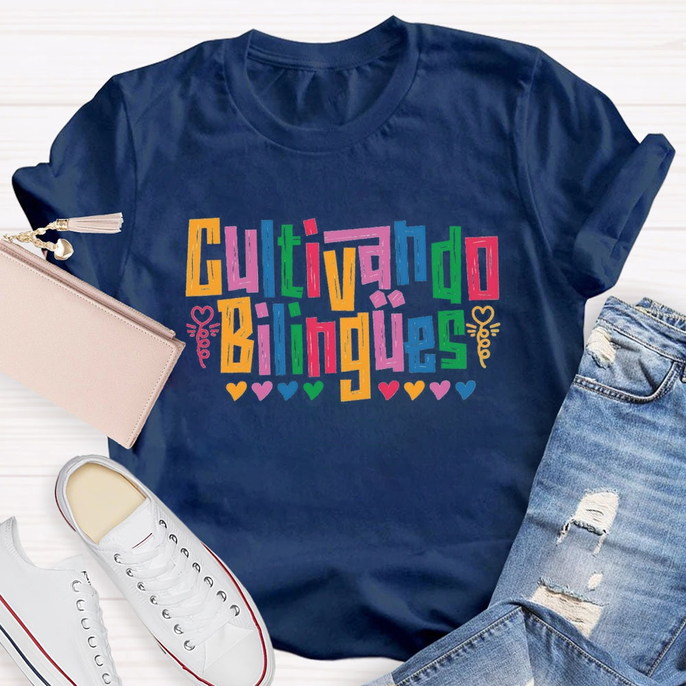 Cultivando Bilingües Bilingual Colored Heart T-shirt