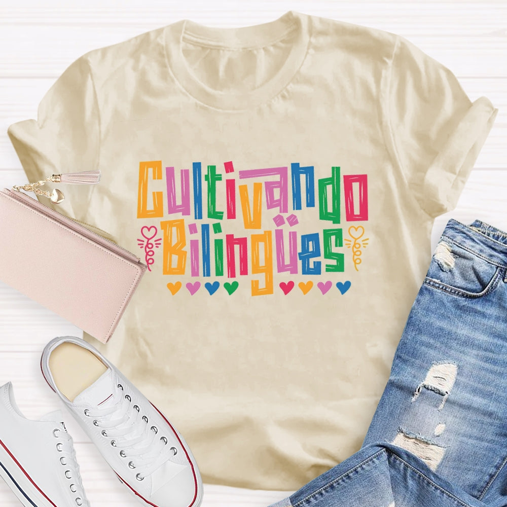 Cultivando Bilingües Bilingual Colored Heart T-shirt