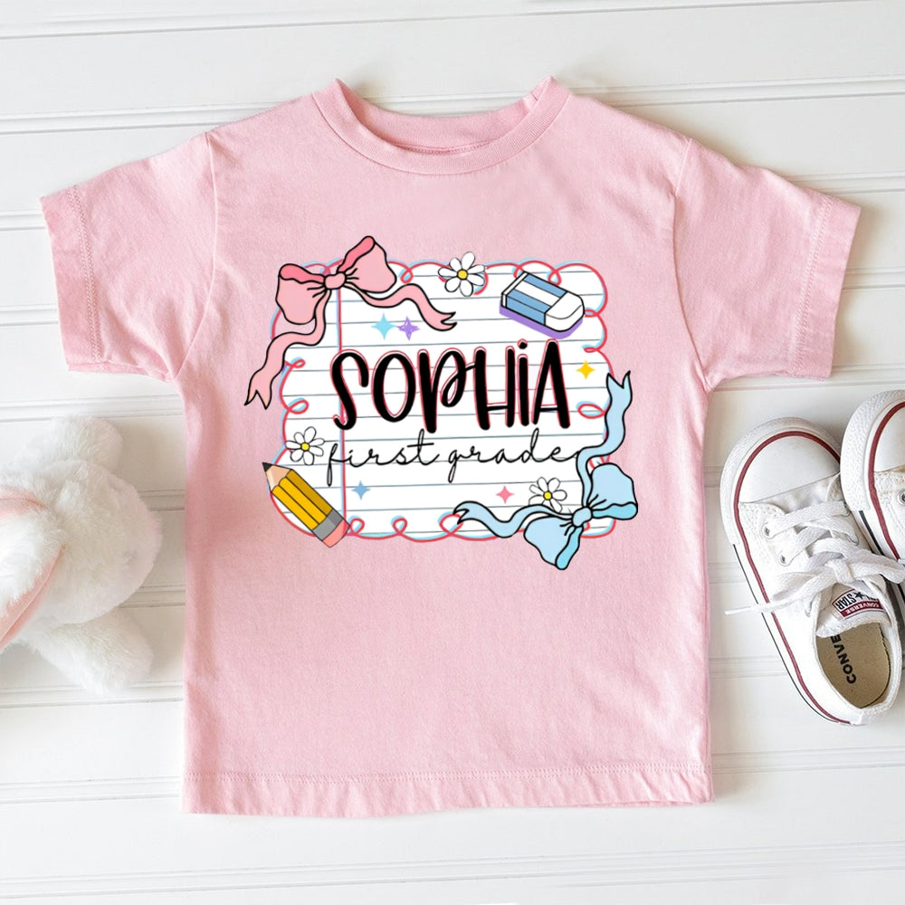 Personalized Name And Grade First Grade Cute Bows And School Supplies Toddler T-shirts