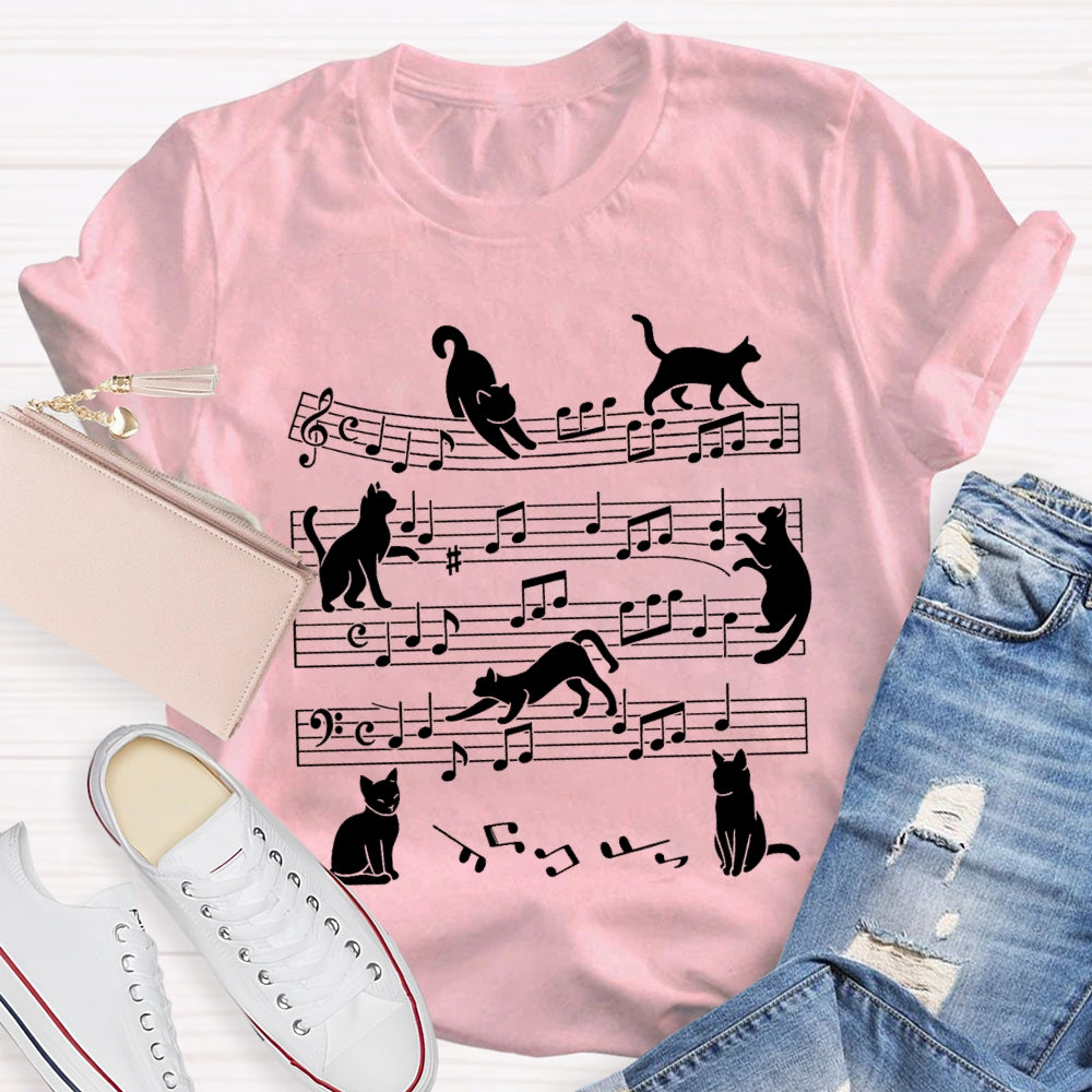 A Group Of Kittens Dancing On Musical Notes Music Teacher T-shirt