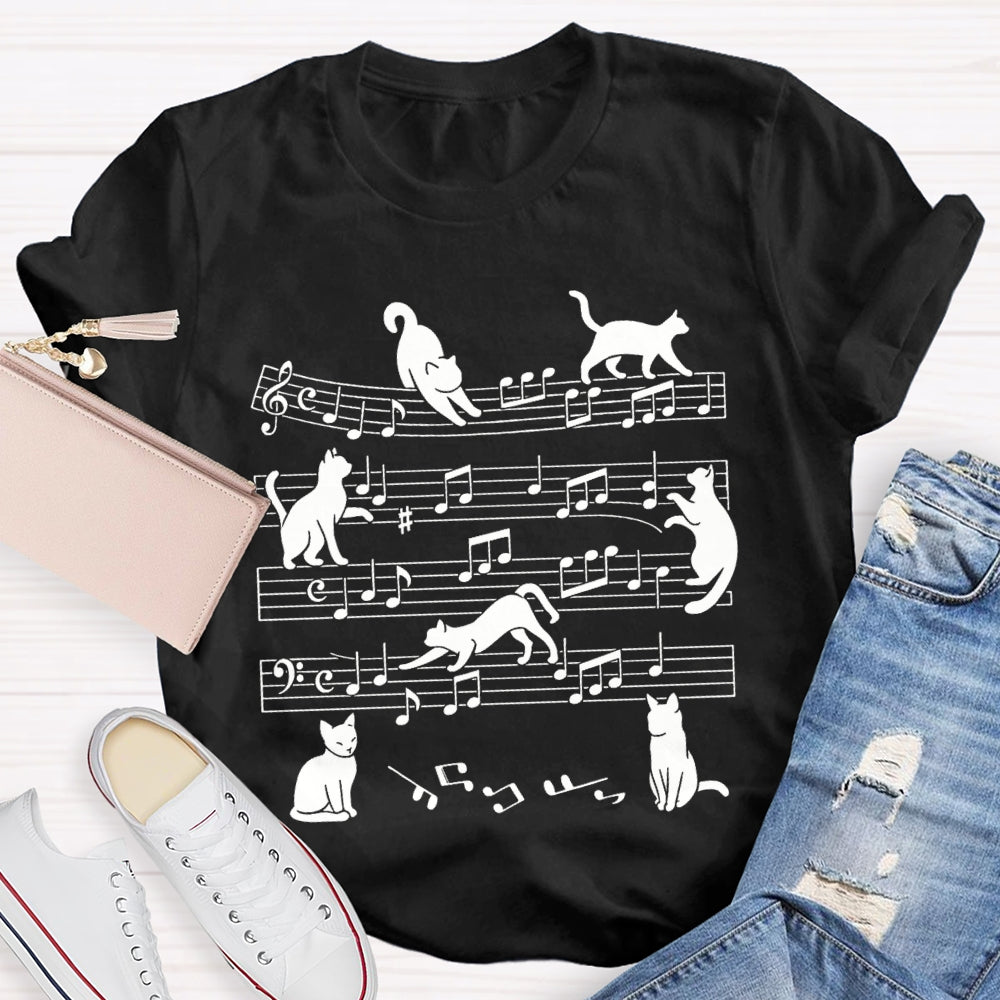 A Group Of Kittens Dancing On Musical Notes Music Teacher T-shirt