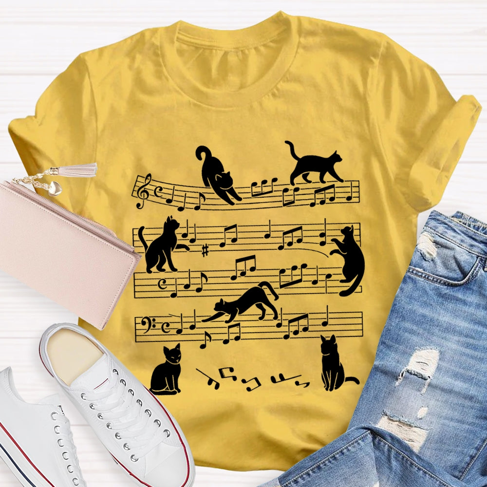 A Group Of Kittens Dancing On Musical Notes Music Teacher T-shirt
