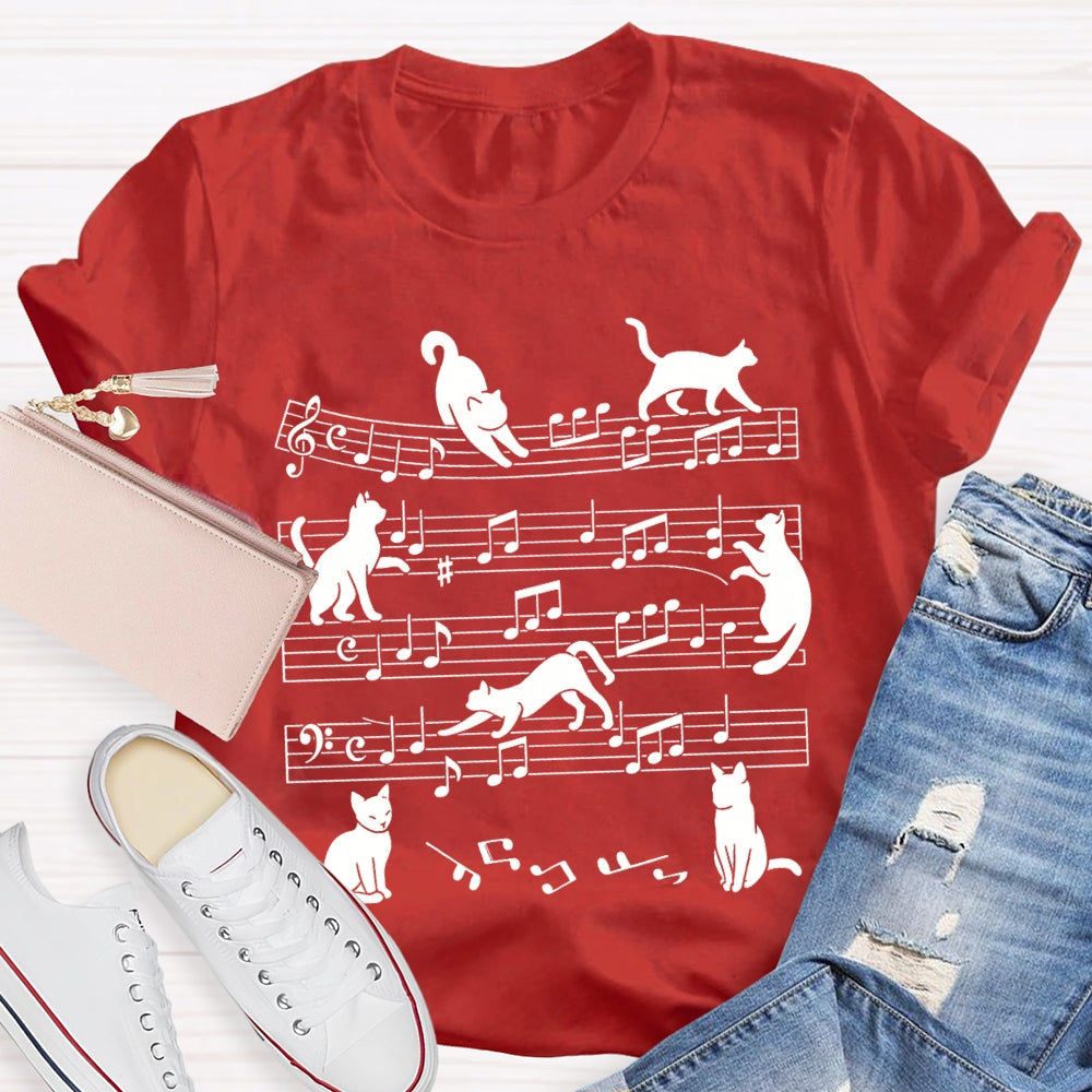 A Group Of Kittens Dancing On Musical Notes Music Teacher T-shirt