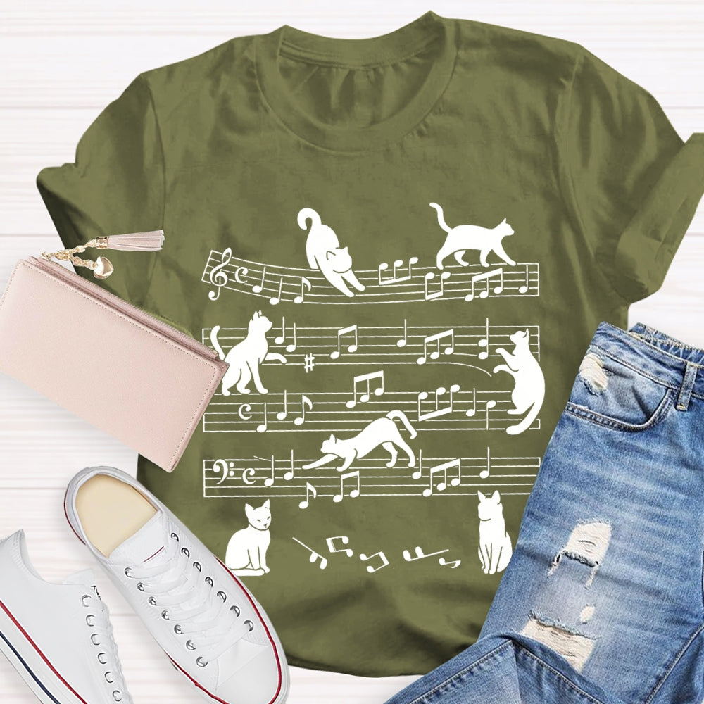 A Group Of Kittens Dancing On Musical Notes Music Teacher T-shirt