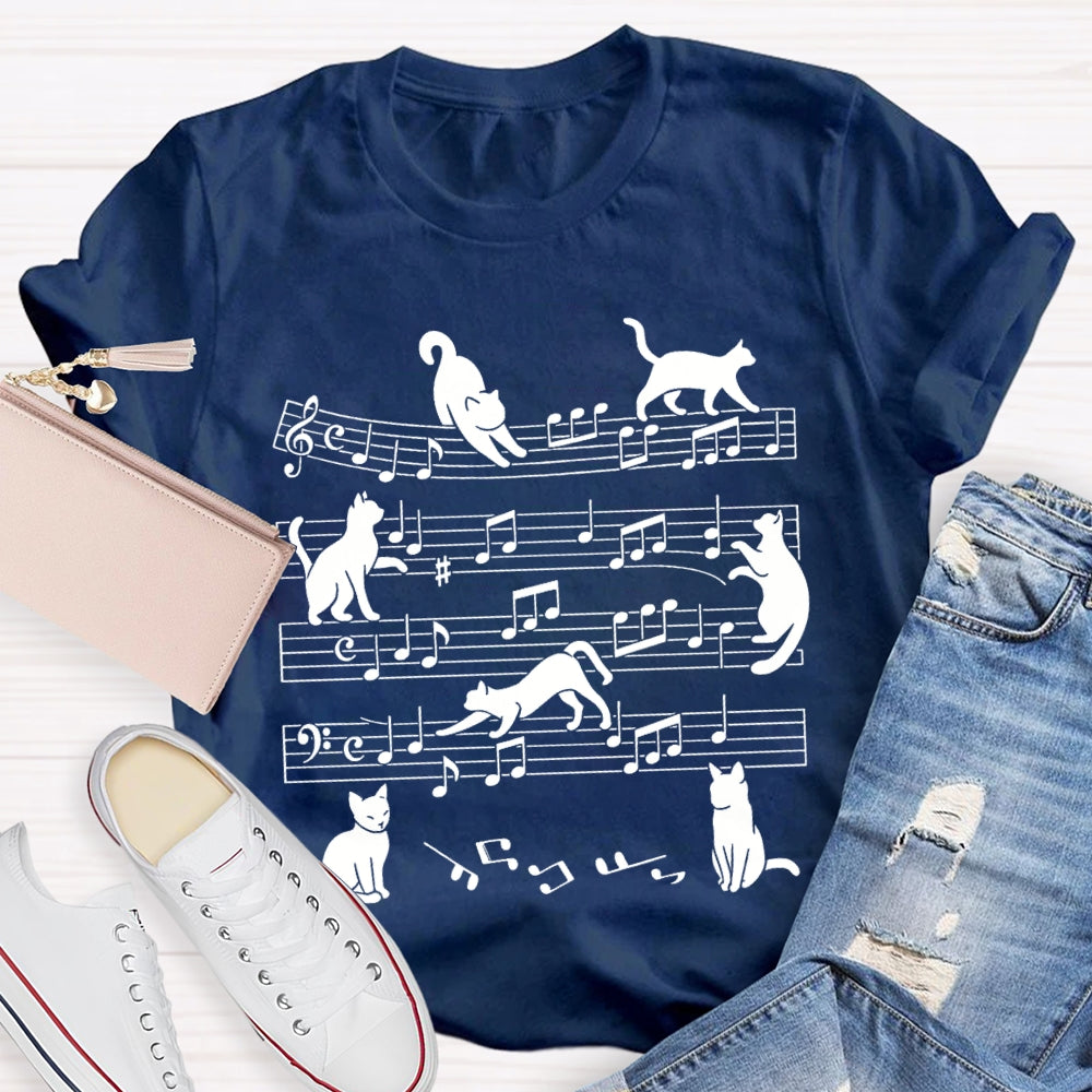 A Group Of Kittens Dancing On Musical Notes Music Teacher T-shirt