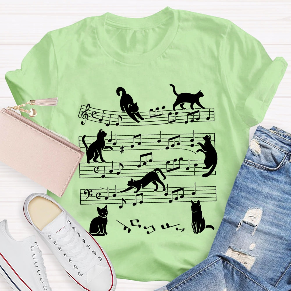 A Group Of Kittens Dancing On Musical Notes Music Teacher T-shirt