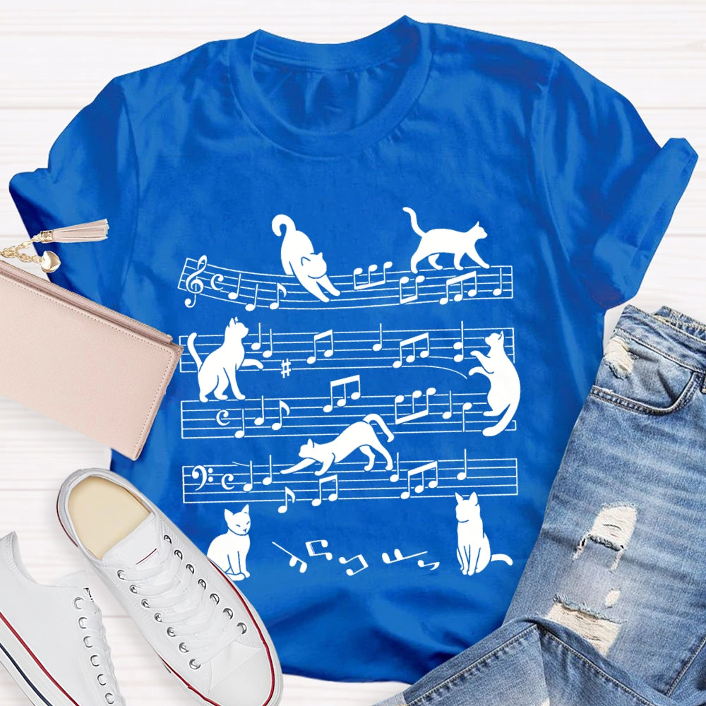 A Group Of Kittens Dancing On Musical Notes Music Teacher T-shirt