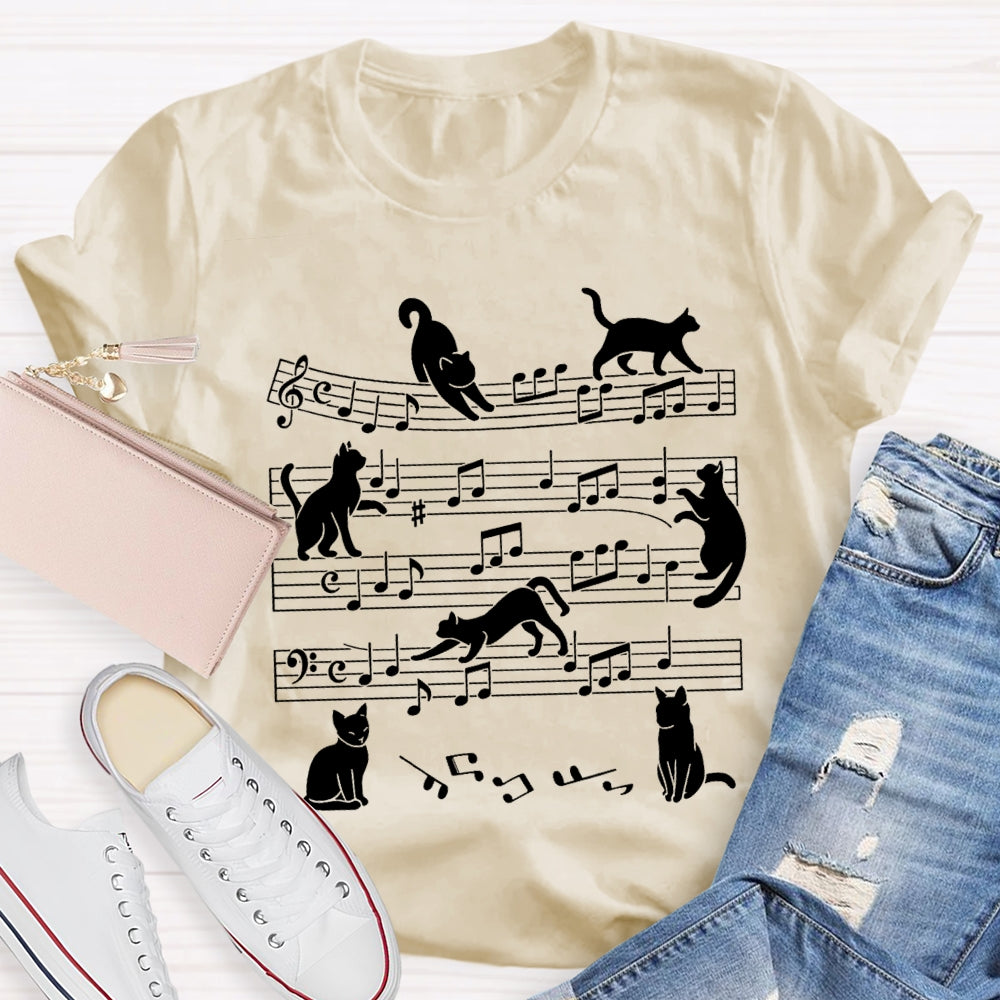 A Group Of Kittens Dancing On Musical Notes Music Teacher T-shirt