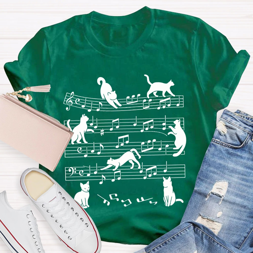 A Group Of Kittens Dancing On Musical Notes Music Teacher T-shirt