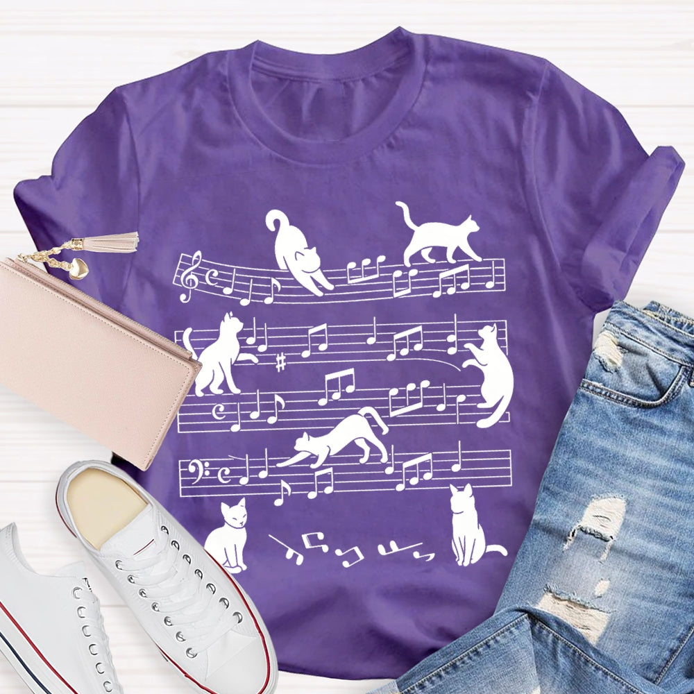 A Group Of Kittens Dancing On Musical Notes Music Teacher T-shirt