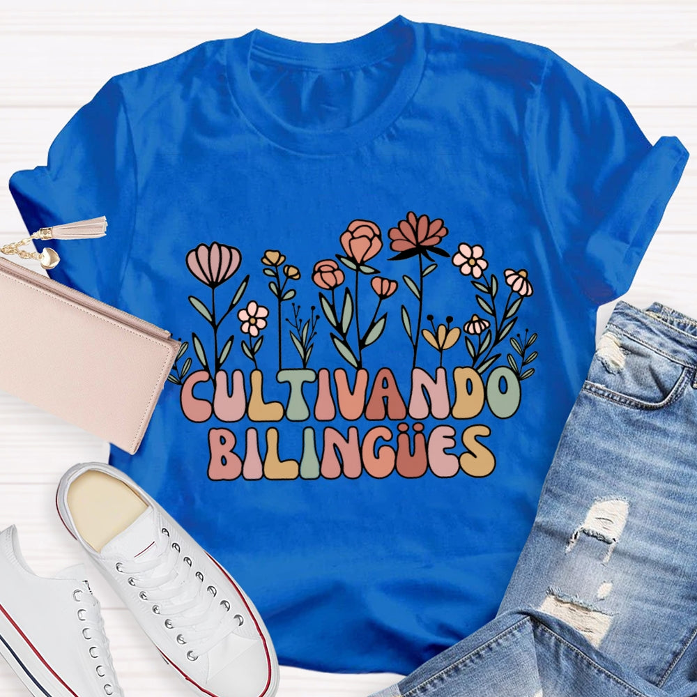 Cultivando Bilingues Colorful Fonts And Small Flowers Bilingual Teacher T-shirt