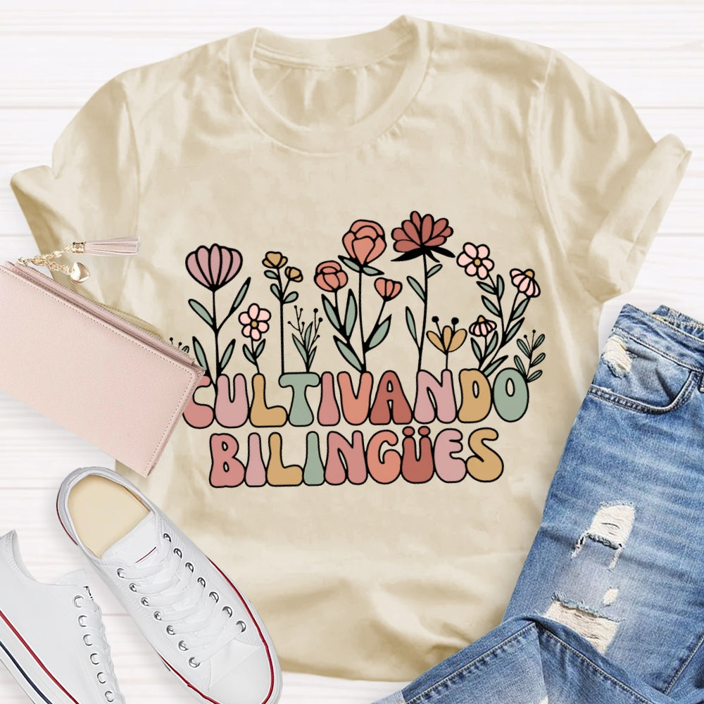 Cultivando Bilingues Colorful Fonts And Small Flowers Bilingual Teacher T-shirt