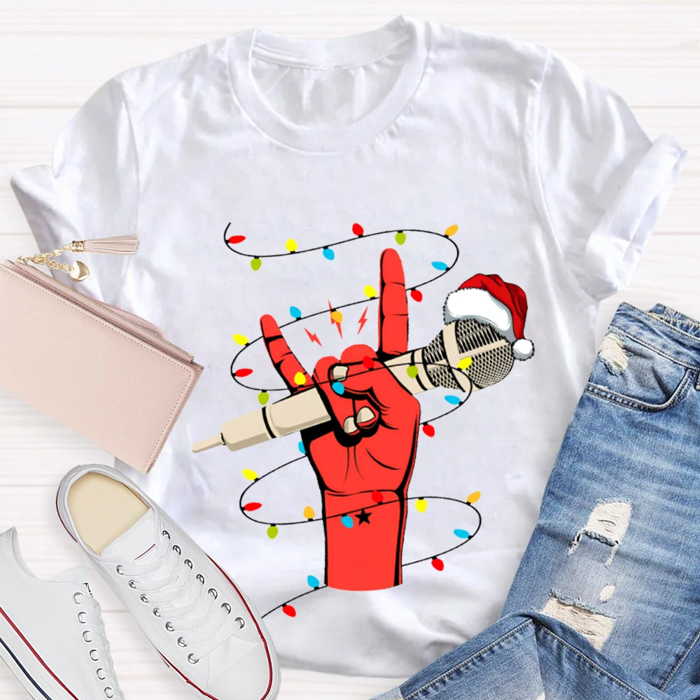 Holding A Microphone Wearing A Santa Hat And Christmas Lights T-shirt