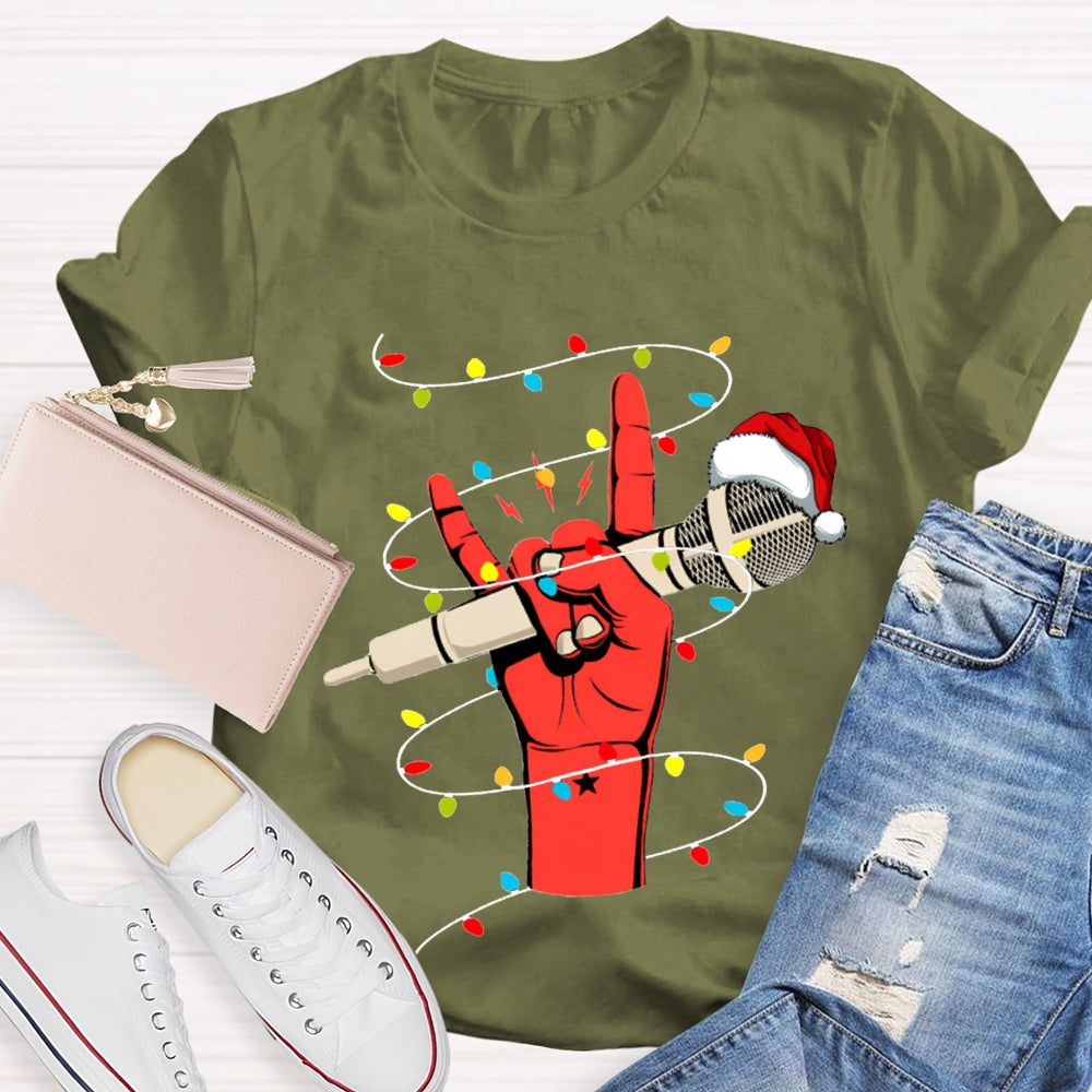 Holding A Microphone Wearing A Santa Hat And Christmas Lights T-shirt
