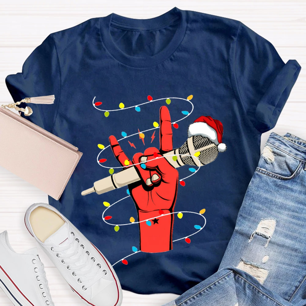 Holding A Microphone Wearing A Santa Hat And Christmas Lights T-shirt