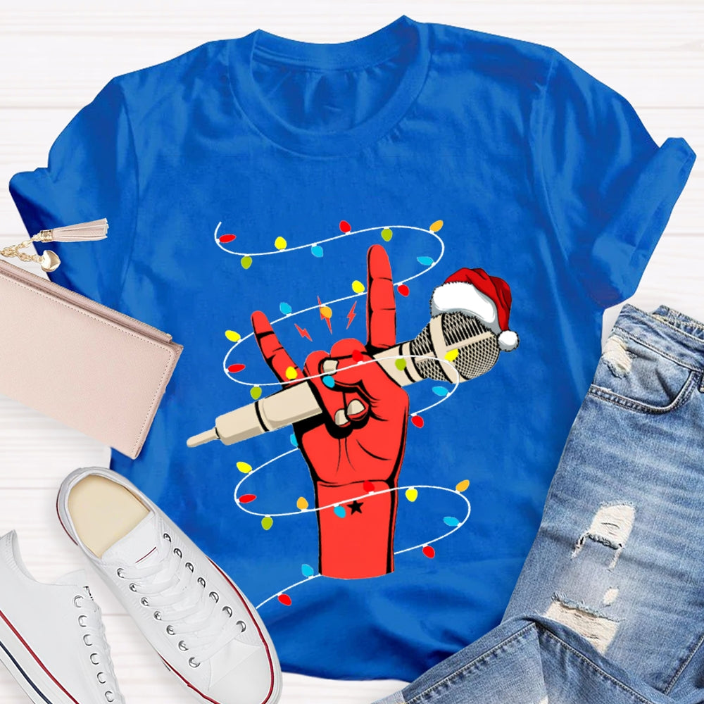 Holding A Microphone Wearing A Santa Hat And Christmas Lights T-shirt