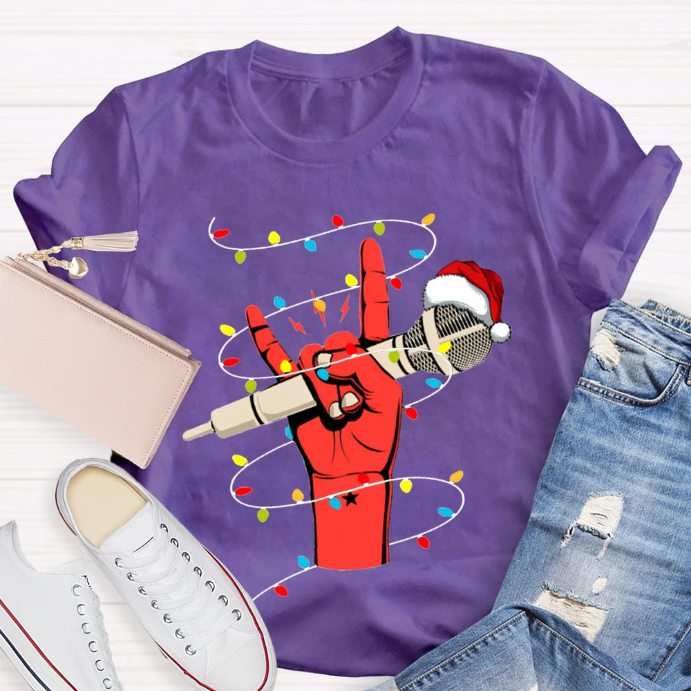 Holding A Microphone Wearing A Santa Hat And Christmas Lights T-shirt