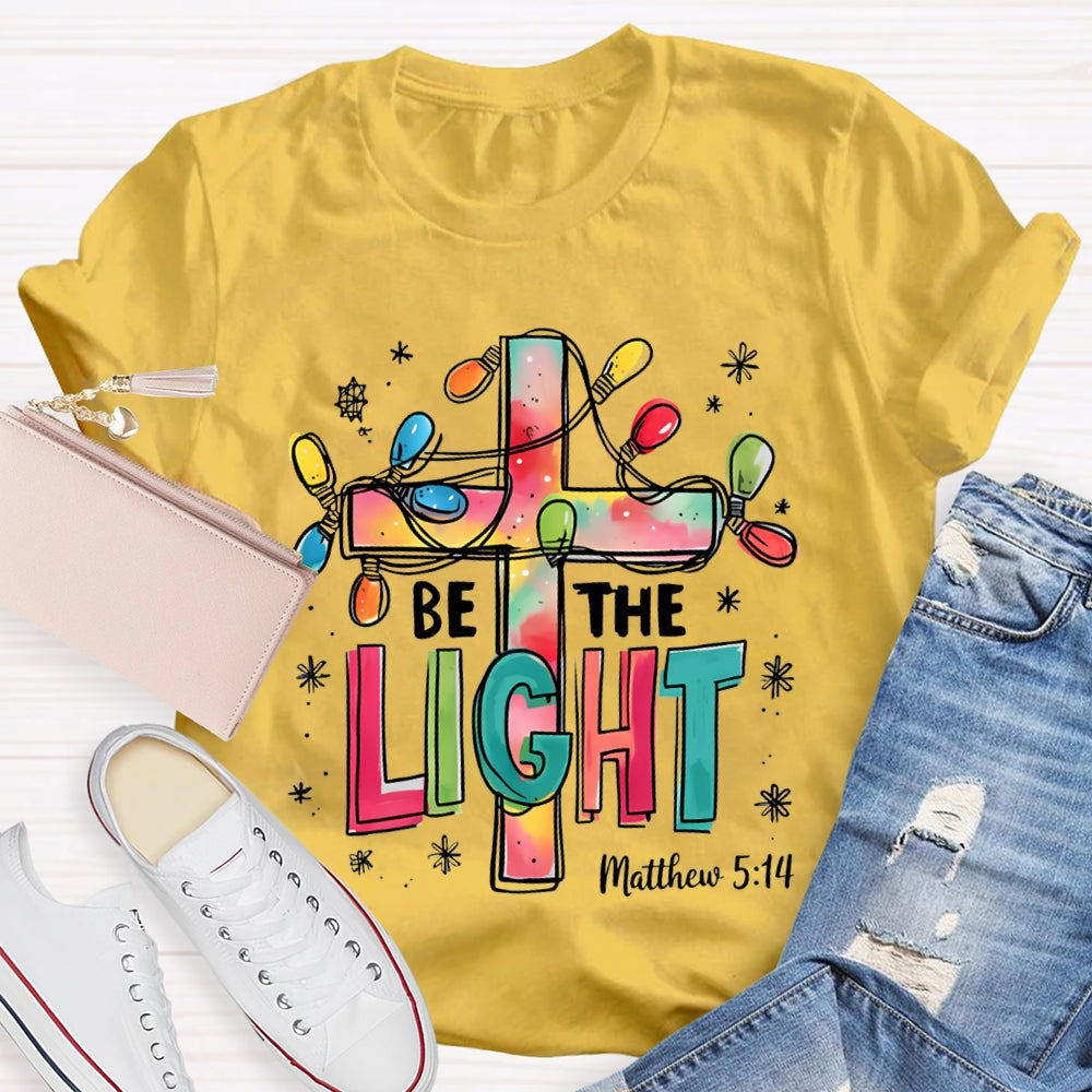 Be The Light Matthew Colorful Fonts And Christmas Lights T-shirt