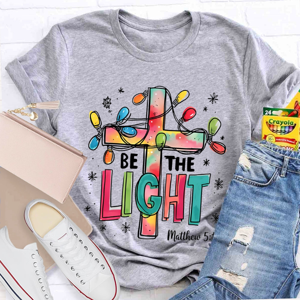 Be The Light Matthew Colorful Fonts And Christmas Lights T-shirt