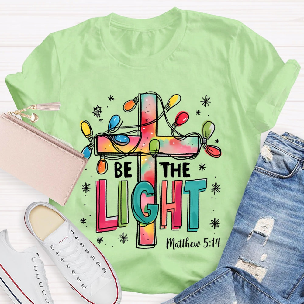 Be The Light Matthew Colorful Fonts And Christmas Lights T-shirt