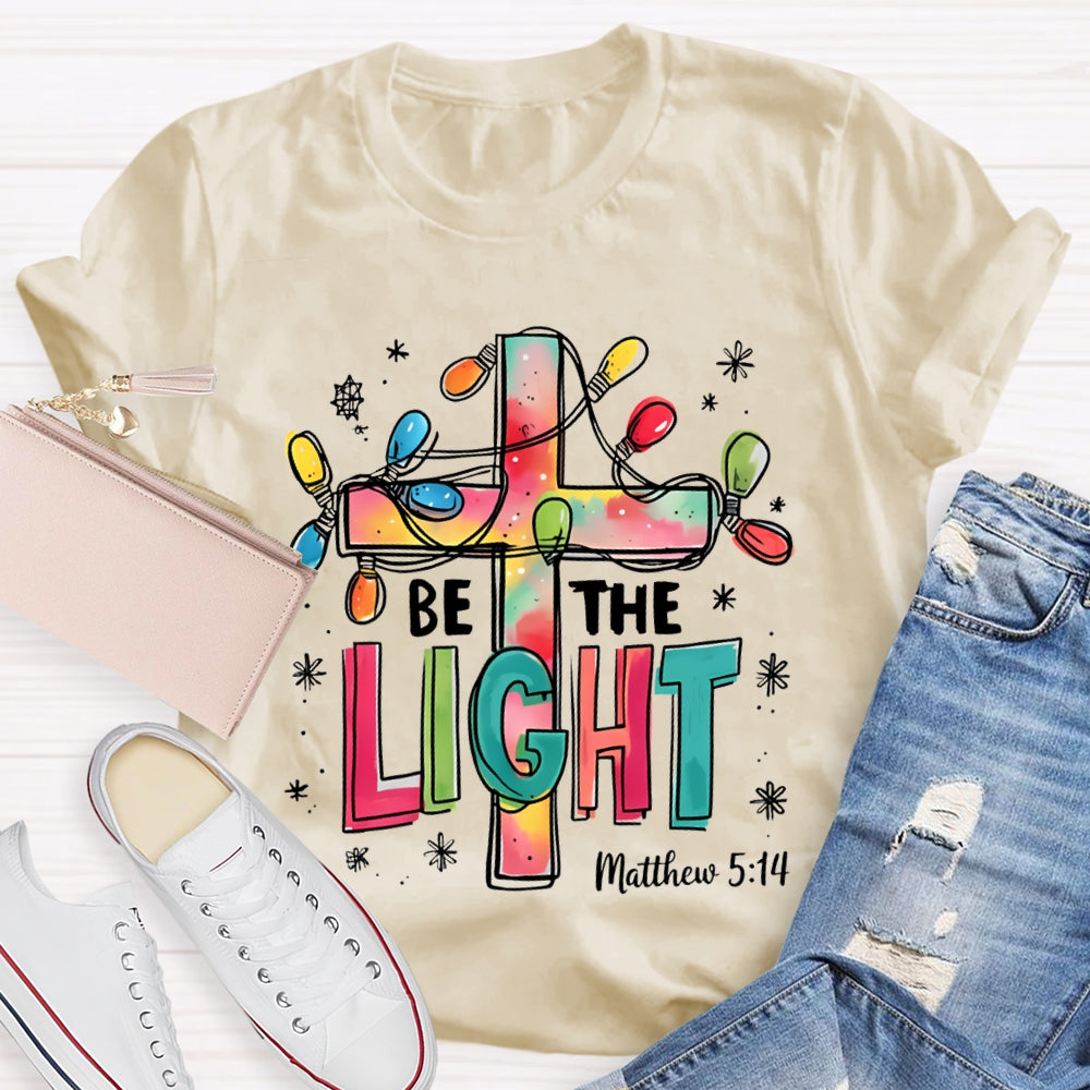 Be The Light Matthew Colorful Fonts And Christmas Lights T-shirt