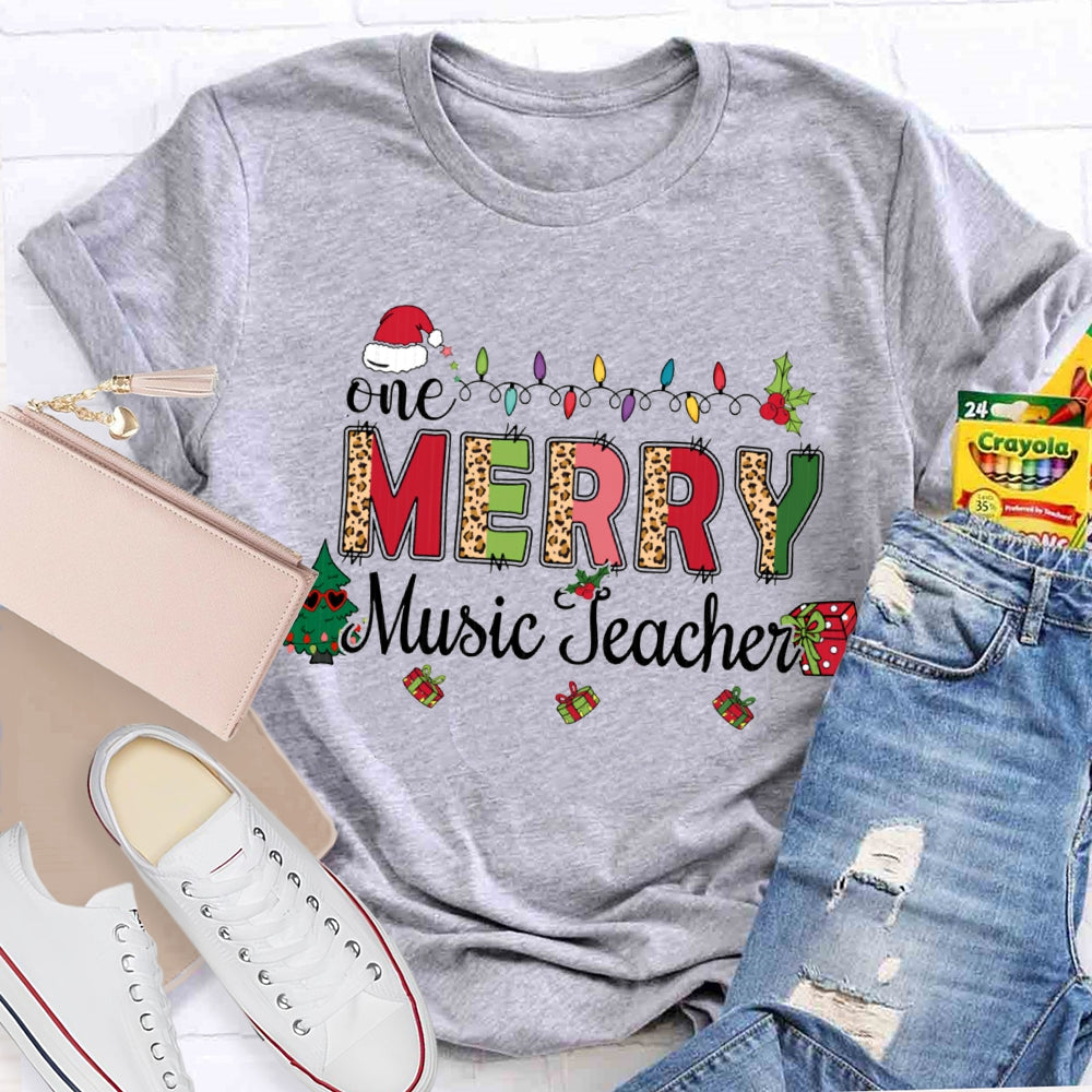 Merry Music Teacher Christmas Lights And Colorful Leopard Print Font T-shirt
