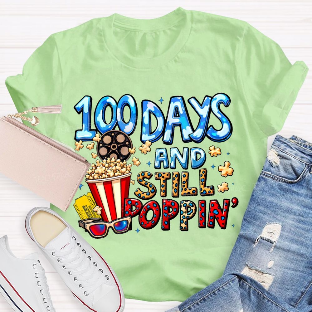 100 Days And Still Poppin Popcorn And Leopard Print Font T-shirt