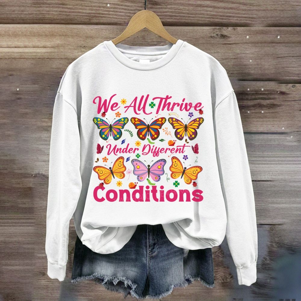 We All Thrive Under Different Conditions Different Butterfly Sweatshirt