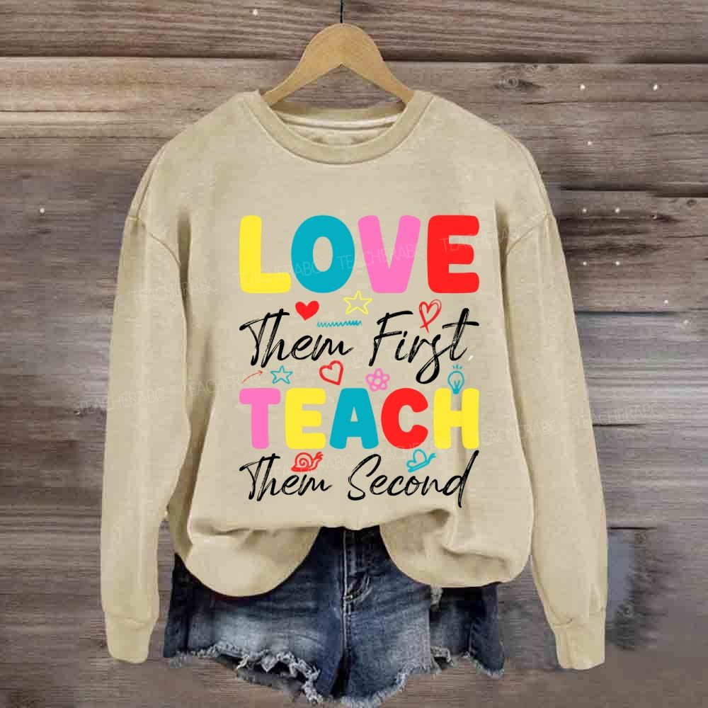 Love Them First Teach Them Second With Heart Sweatshirt