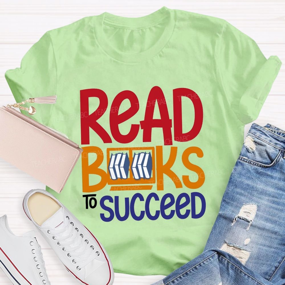 Read Books To Succeed Colored Fonts Teacher T-shirt