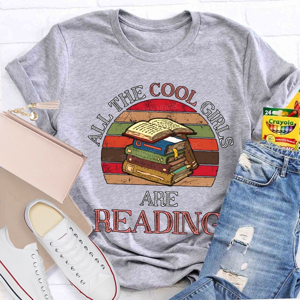 All The Cool Girls Are Reading Color Books Teacher T-shirt