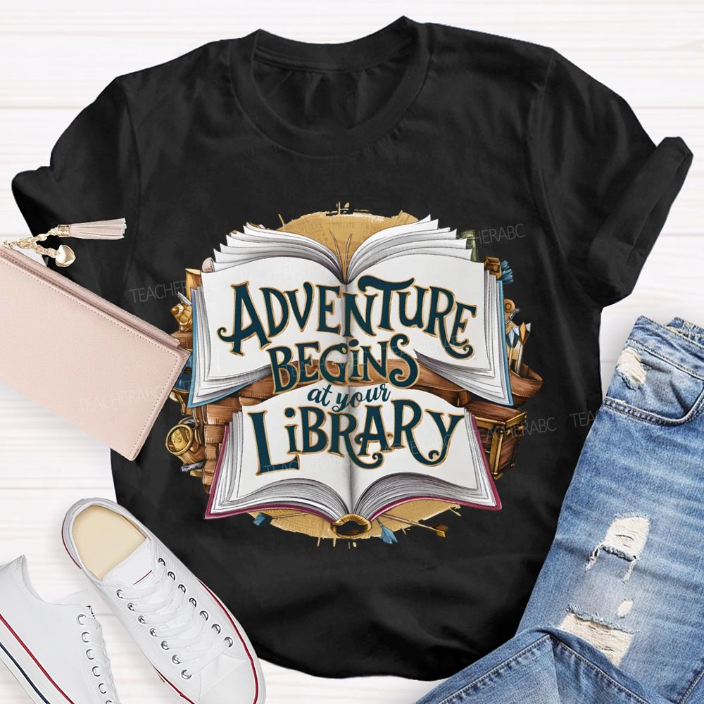 Adventure Begins At Your Library Teacher T-shirt