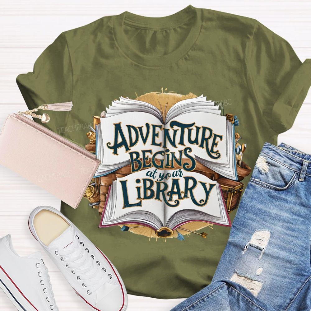 Adventure Begins At Your Library Teacher T-shirt