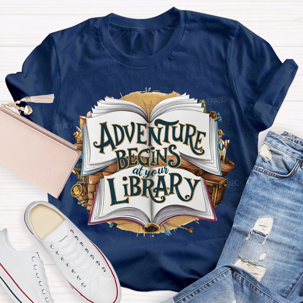 Adventure Begins At Your Library Teacher T-shirt