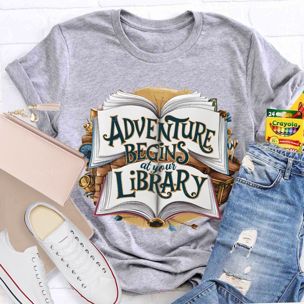 Adventure Begins At Your Library Teacher T-shirt