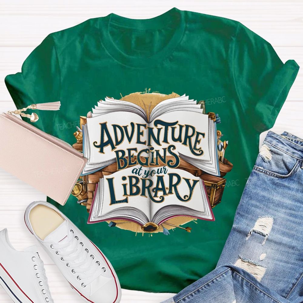 Adventure Begins At Your Library Teacher T-shirt