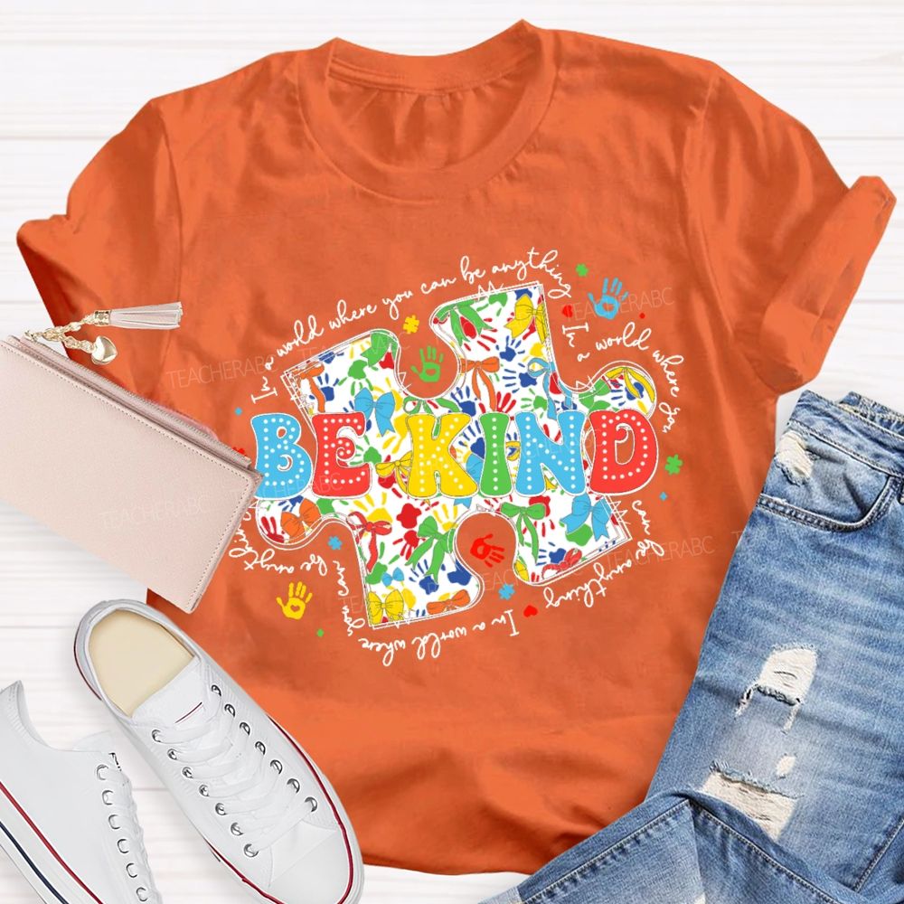 In A World Where You Can Be Anything Be Kind Colorful Letters Puzzle Teacher T-shirt