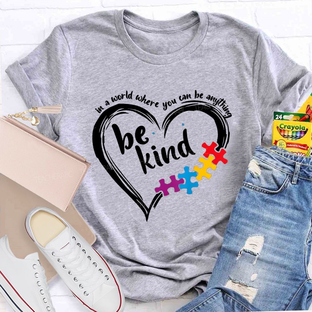 In A World Where You Can Be Anything Be Kind Heart Puzzle Teacher T-shirt