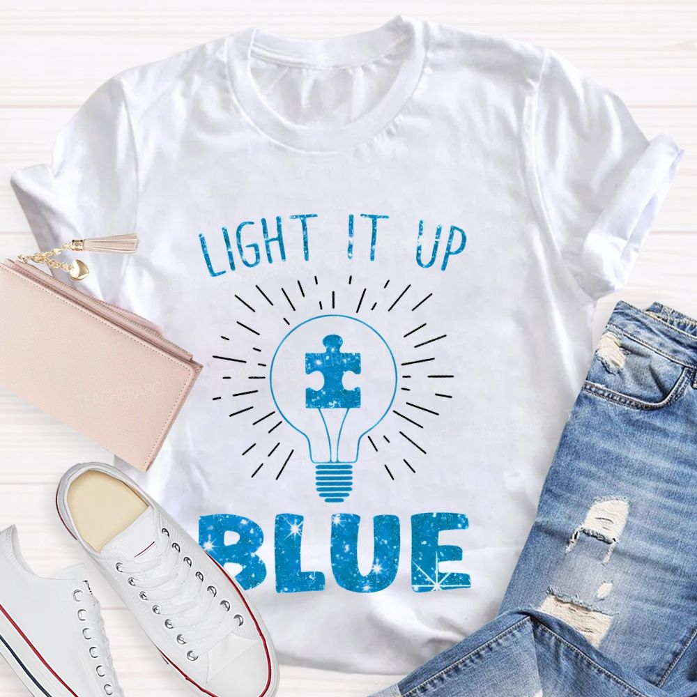 Light It Up Blue Light Bulb Graphic Teacher T-shirt