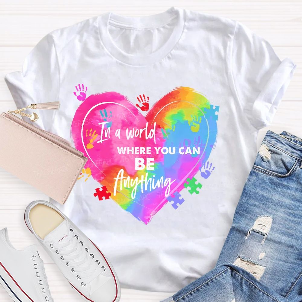 In A World Where You Can Be Anything Colorful Handprint Teacher T-shirt