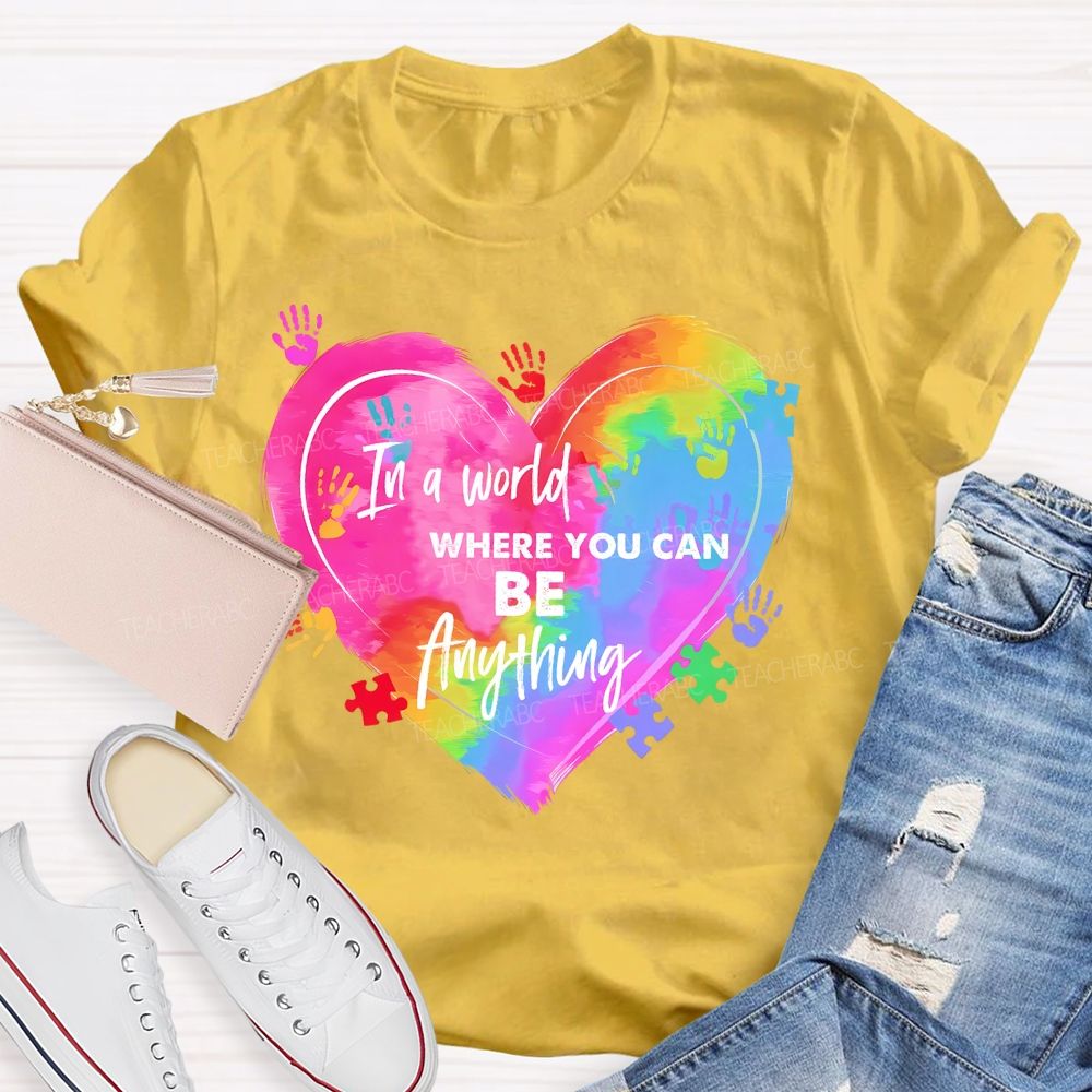 In A World Where You Can Be Anything Colorful Handprint Teacher T-shirt