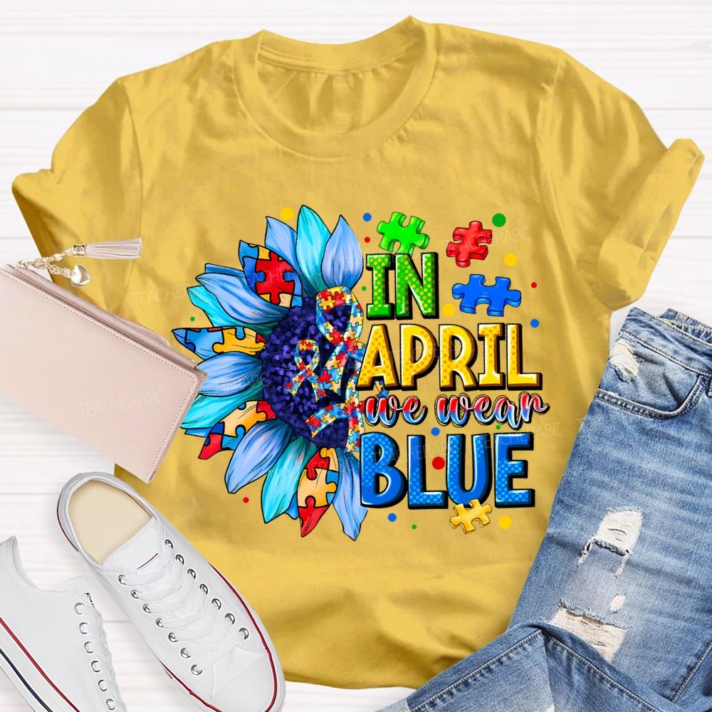 In April We Wear Blue Autism Awareness Blue Sunflower Teacher T-shirt