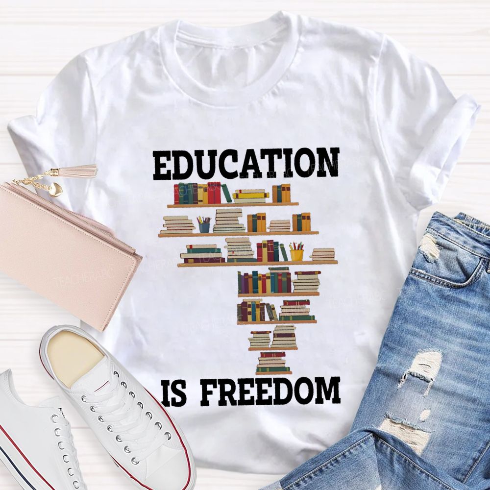 Education Is Freedom Fall In Love With Reading Teacher T-shirt