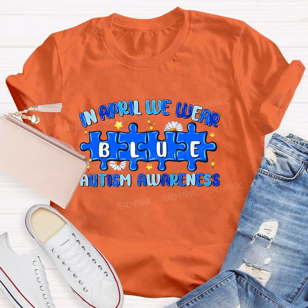 In April We Wear Blue Autism Awareness Blue Puzzle Star Teacher T-shirt