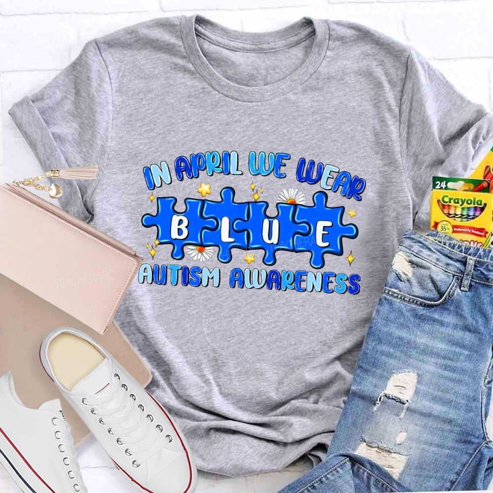 In April We Wear Blue Autism Awareness Blue Puzzle Star Teacher T-shirt