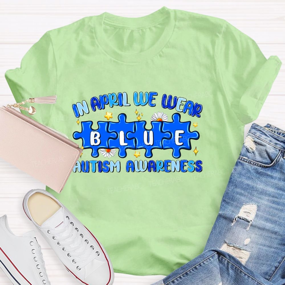 In April We Wear Blue Autism Awareness Blue Puzzle Star Teacher T-shirt