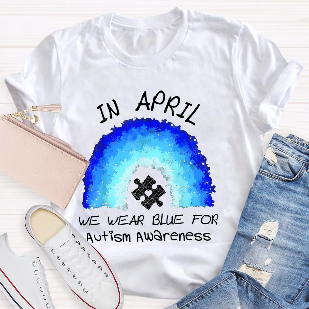 In April We Wear Blue For Autism Awareness Rainbow Puzzle Pattern Teacher T-shirt