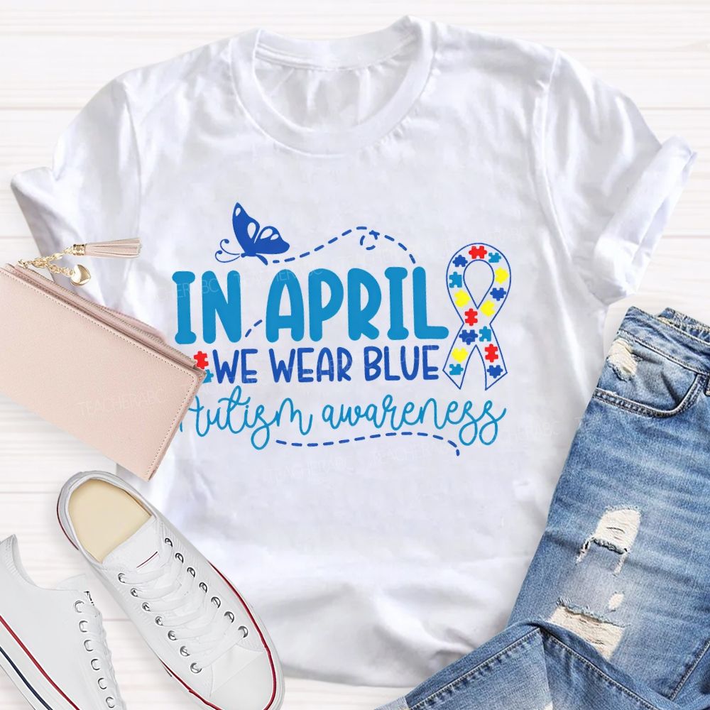 In April We Wear Blue Autism Awareness Puzzle Ribbon Teacher T-shirt