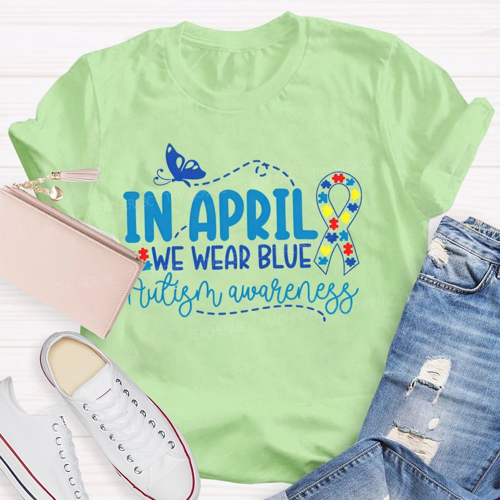 In April We Wear Blue Autism Awareness Puzzle Ribbon Teacher T-shirt